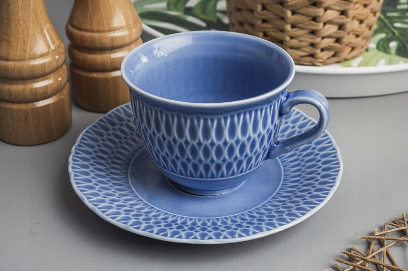 Embossed cup and saucer set